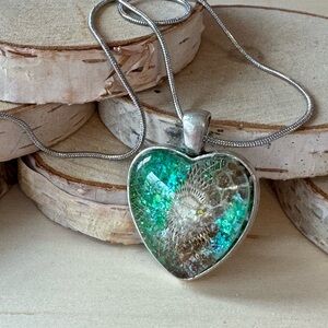 Elegant Silver Heart Necklace with Green Highlights